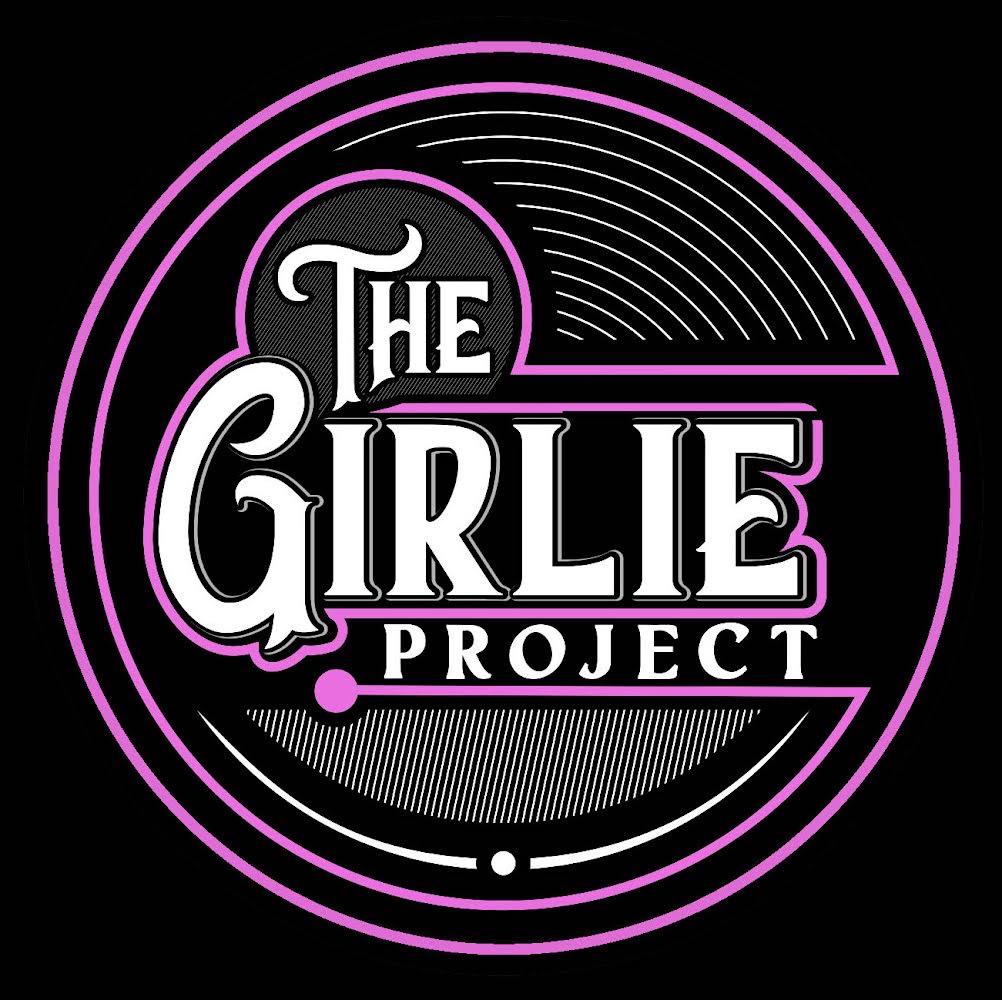 The Girlie Project in white text on black background surrounded by purple lines