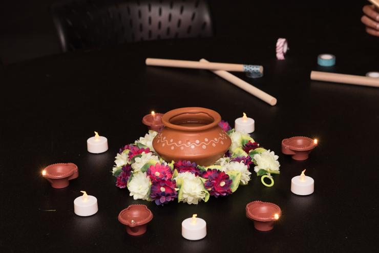 Shot of candles and flowers around a table