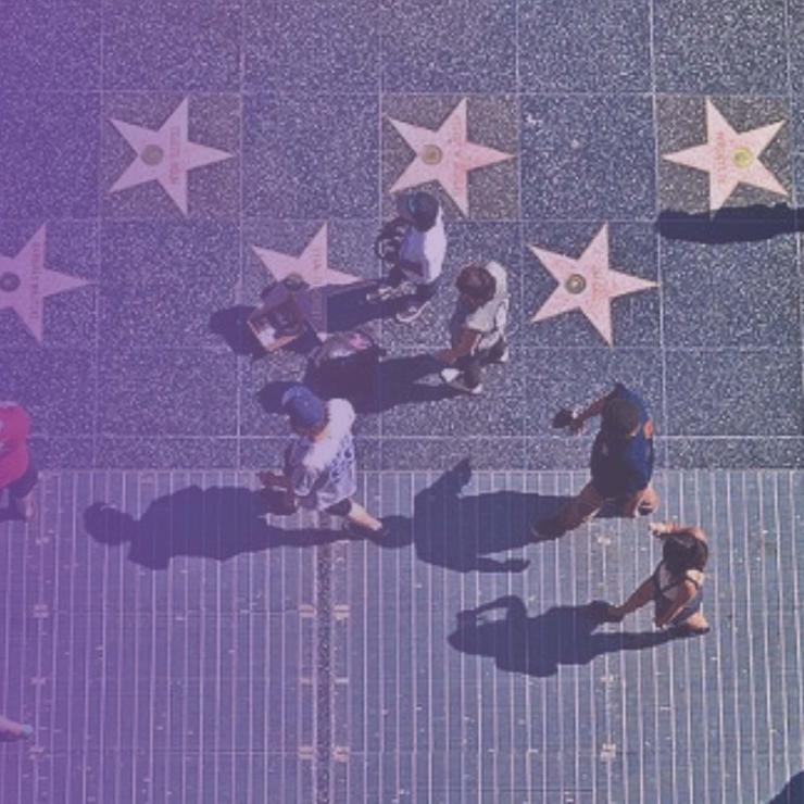 Overhead view of people walking on Hollywood walk of fame