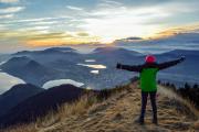A student overlooking a beautiful view on a hike