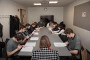 A professor leading a scriptwriting course at Emerson College
