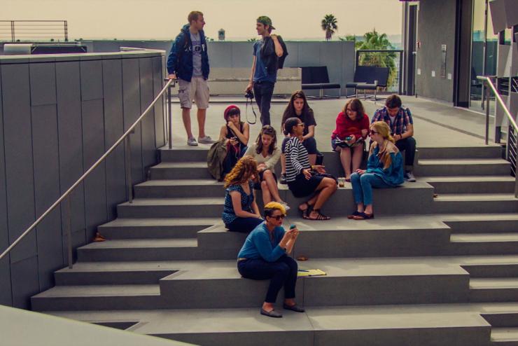 large group of students sitting on steps outside Emerson Los Angeles